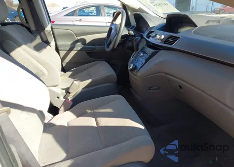 2011 Honda Odyssey Lx z USA, uszkodzony, nr VIN 5FNRL5H29BB00710